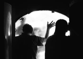Hands on a simulated space station during the filming of the Flaming Lips' 'Christmas on Mars'