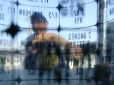 Derek, viewed through a glass.
