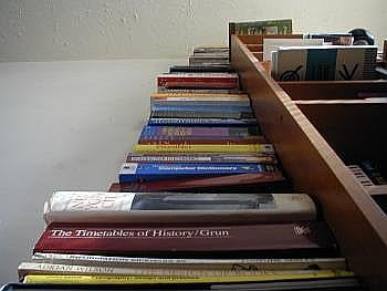 7'6" stack of books.