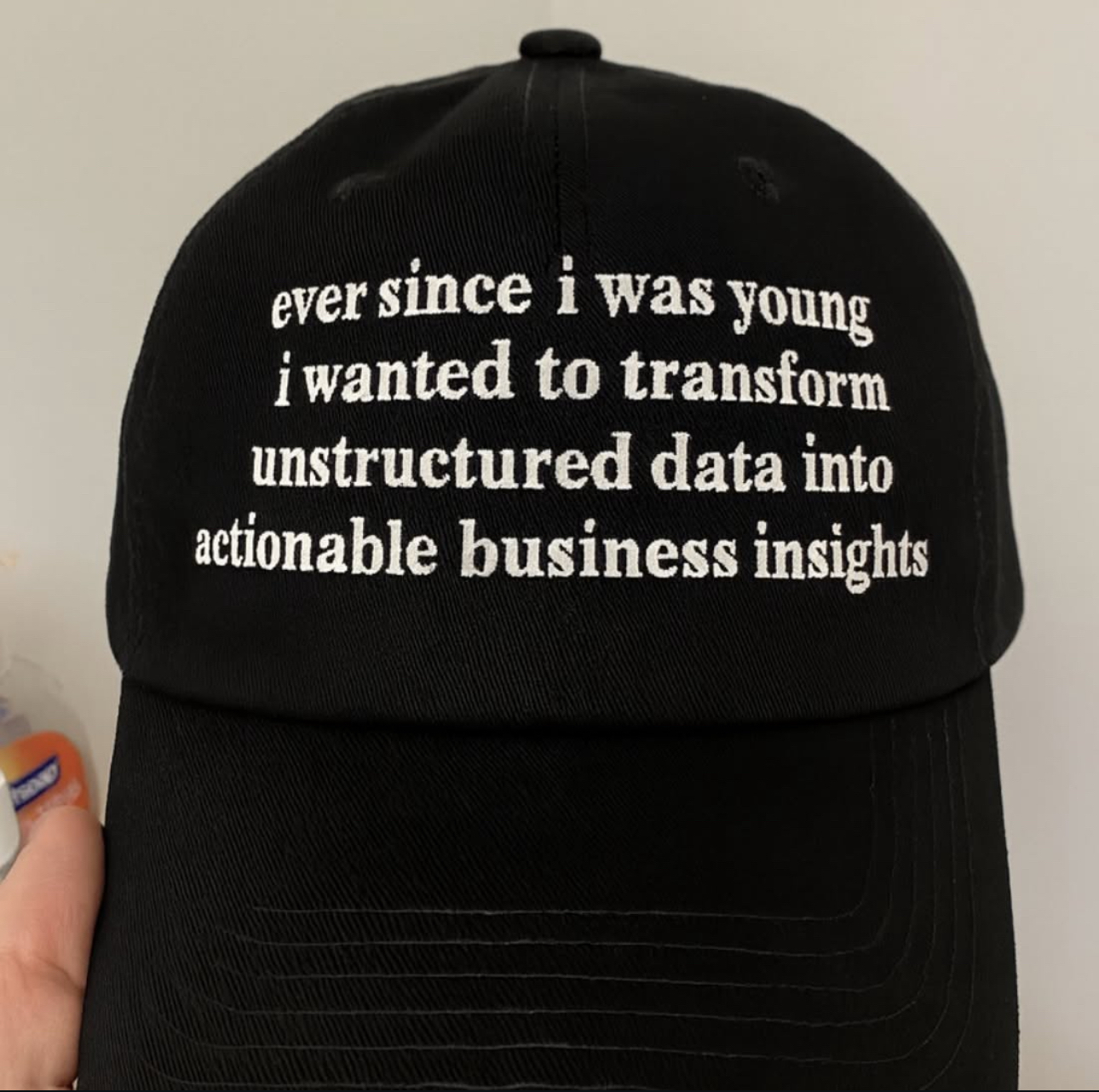 A hat that reads “ever since i was young i wanted to transform unstructured data into actionable business insights”
